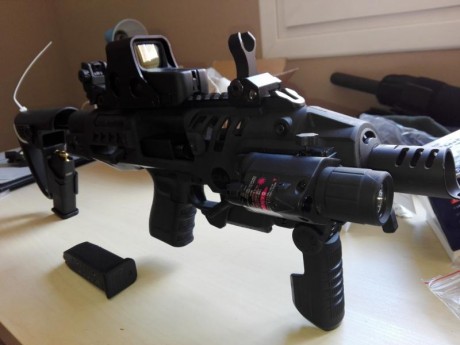 Estaría interesado en la compra de un smith&wesson 15 calibre 22lr.  , lo cambiaría por un kit roni 01