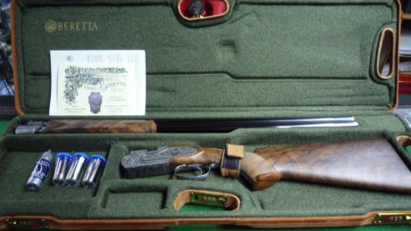 escopeta Beretta Guiubileo,cal,20 sin estrenar,impoluta,5 choques,la vende un amigo su teléfono es 634648938,vende 02