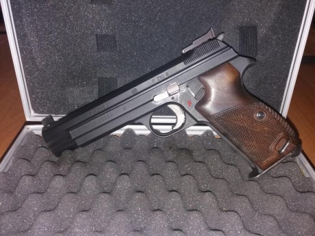 Vendo  pistola Sig P210-6 de 9mm. La vendo o cambio por una pistola de aire Steyr, Walther LP400 o similar. 00