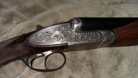 Un amigo me pasa esta escopeta que pone en venta. 
Cañon 69; 6 y 10 décimas. Recámaras 18.5
Cañones cromo-niquel. 02