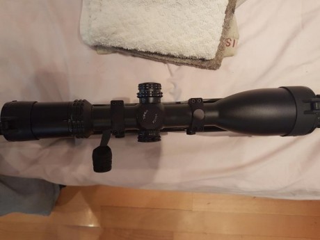 Hola, ahora le toca a este visor 4-20X56 reticula iluminada,  imitacion Swarovski,  fabricado por Ohhunt, 00
