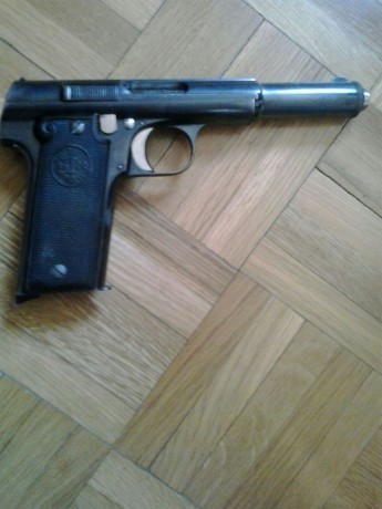 Un amigo, por jubilación, vende pistola Astra 400, perfectamente conservada, está guiada en A, pero puede 01