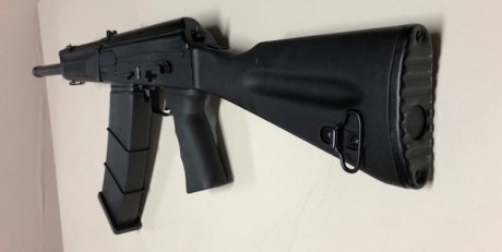 Hola!! 
Vendo la Saiga 12 sin apenas uso, solo se disparó 40 cartuchos y se guardó hasta ahora. El arma 21