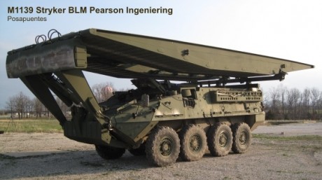 Buenas tardes carristas.
Solicito vuestra ayuda para identificar una versión del vehiculo 8x8 Stryker 00