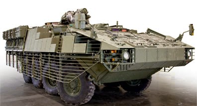 Buenas tardes carristas.
Solicito vuestra ayuda para identificar una versión del vehiculo 8x8 Stryker 91