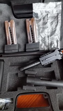 Se vende pistola HAMMERLI modelo SP20 RRS del calibre 32  y  carro del 22lr. Cola disparador recta , tambien 30