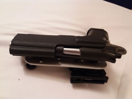 Vendo pistola BUL M5 5" .45 ACP con dos cargadores de 14 y uno de 12.

Para quien no la conozca es 00