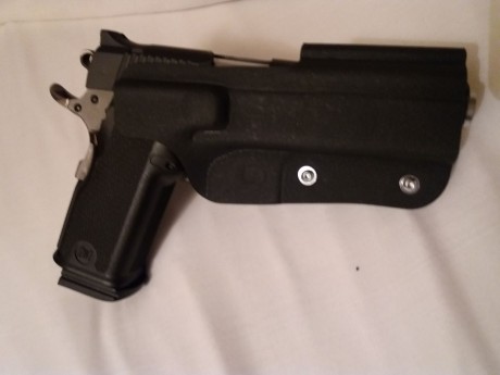 Vendo pistola BUL M5 5" .45 ACP con dos cargadores de 14 y uno de 12.

Para quien no la conozca es 21