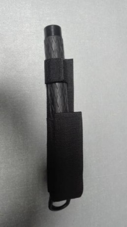 Se vende defensa extensible de 65 cm, de acero,nueva, mango de goma, funda de cordura. Precio 25 euros. 01