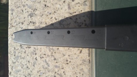 Hola, vendo cargador de marca Sig Sauer extralargo para calibre 9mm aunque las balas del 40 sw entran 01