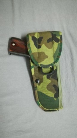 Por limpieza de accesorios que no uso vendo esta funda tipo bianchi, no es original pero es igual de funcional 00