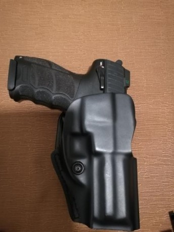 Vendo este lote para HK P30 ,compuesto de :

- Cargador ORIGINAL HK  de 15 cartuchos como nuevo .
- Funda 01