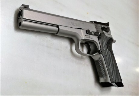    Se vende Pistola S&W Performance center Model 5906 PPC-9 6"   

   Con 3 cargadores.
3 Cachas.
Una 100