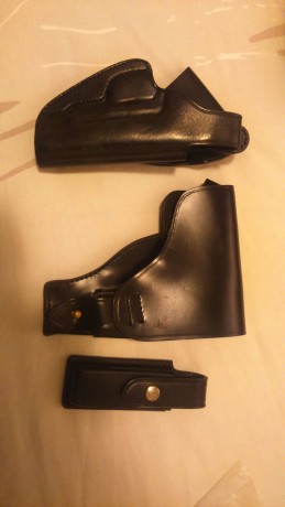 Un compañero vende unas fundas de pistola STAR BM y un portacargador, se trata de una funda de extracción 00