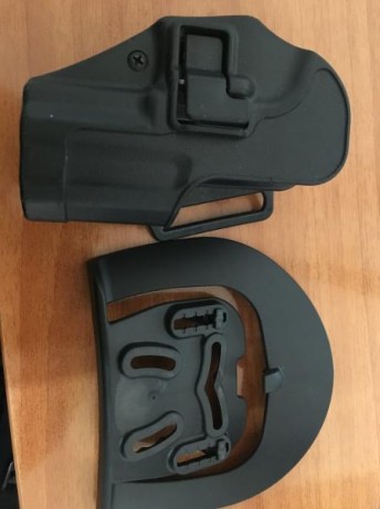 VENDO UNA FUNDA PARA HK USP COMPACT DE LA PRESTIGIOSA MARCA BLACKHAWK.

PRECIO 33€, ENVÍO INCLUIDO. SU 02