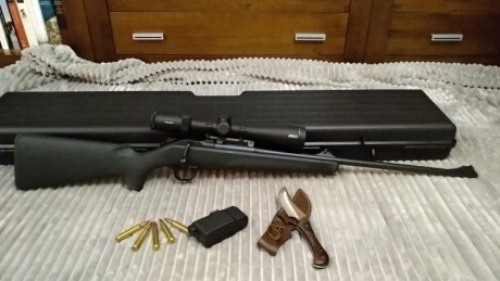 Blaser R8 modelo profesional,culata sintética en color verde antracita,gatillo extraíble no fijo,cañón 00