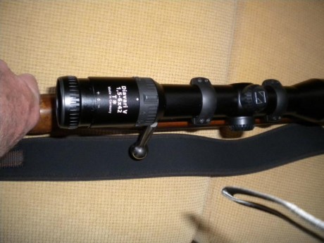 un amigo vende un rifle máuser m03 calibre 8x68s con monturas máuser de anillas 30mm y visor zeiss diavari 12