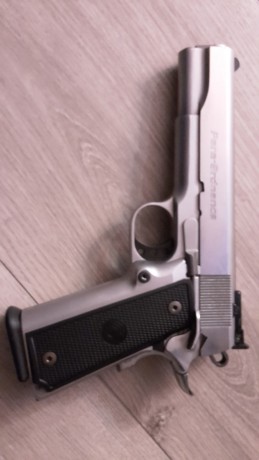 Se vende pistola paraordenence del calibre 40 de acero inoxidable con cañon briley del 9 pb, especial 22