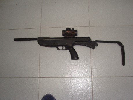 Hola.
Una Gamo 68 muy modificada.
calibre 4,5.
Nulo esfuerzo para quebrar el cañón.
Funciona perfectamente,punto 02
