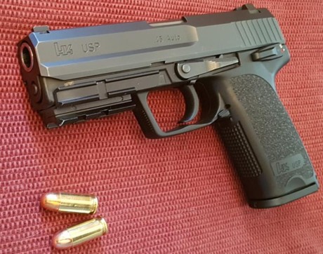   Hola compañeros. Vuelvo a poner a la venta mi fabulosa HK USP 45. IMPECABLE!!!
Viene con los siguientes 10