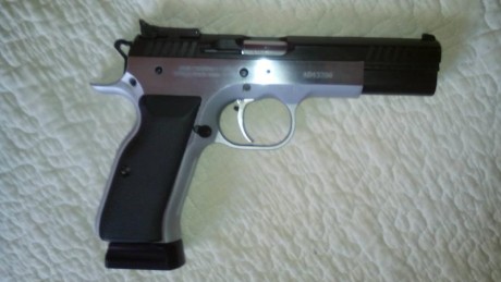 Hola vendo pistola tanfoglio de 9 mm cañon 5 pulgadas practicamente nueva tiene cargador de lujo de 19 10