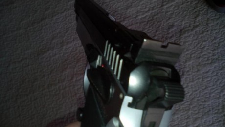 Hola vendo pistola tanfoglio de 9 mm cañon 5 pulgadas practicamente nueva tiene cargador de lujo de 19 21