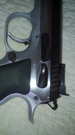 Hola vendo pistola tanfoglio de 9 mm cañon 5 pulgadas practicamente nueva tiene cargador de lujo de 19 20