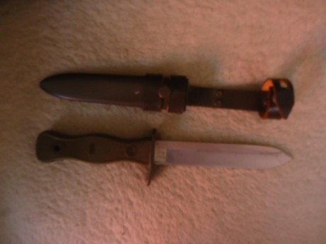 Esta mañana me han regalado este cuchillo.

A ver que os parece.

Un saludo. 00