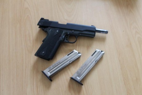 Vendo por cese de actividad esta estupenda  Colt 1911 gold cup calibre 22lr  en perfectas condiciones 10