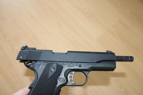 Vendo por cese de actividad esta estupenda  Colt 1911 gold cup calibre 22lr  en perfectas condiciones 21