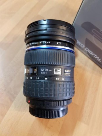 Hola a todos, vendo material de fotografía Olympus. Algunos objetivos sin haber sido usados, en perfectas 12