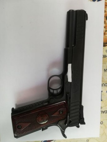 Pistola de 6" con una excelente precisión, y usada para ello,
Varios extras en el conjunto de disparador, 01