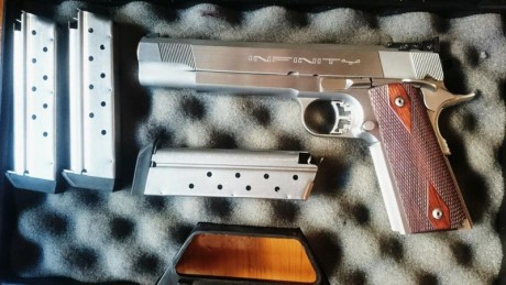 Buenos dias, pongo a la venta pistola infinity scepter 9 mm parabellun en excelente estado.. 01
