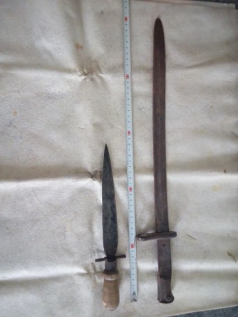 Hola han caído en mis manos lo que creo que es una bayoneta máuser 1913, aunque los marcajes no se ven 00