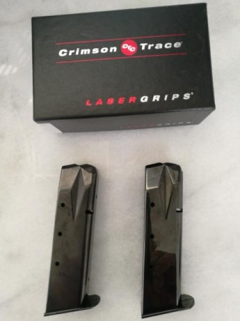 Saludos al foro,vendo unas cachas láser rojo CRIMSON TRACE validas para cualquier SIG SAUER P226,usadas 00
