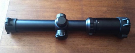 Vendo visor de batida Bushnell trophy xlt 1-4x 24 con tapas Butler creek, nuevo a estrenar, solo ha salido 01