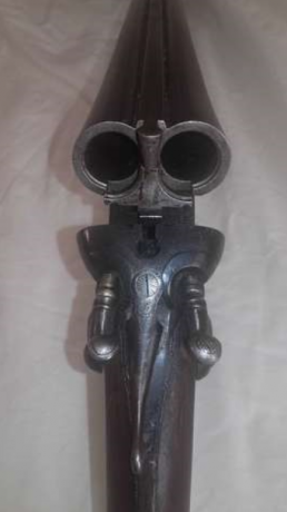 Vendo esta joya de escopeta de perrillos a la vista en perfectas condiciones y dispara perfectamente. 00