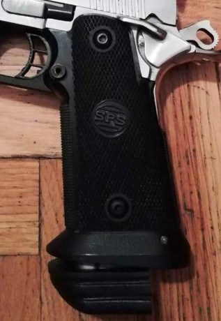 Hola si a alguien le sobra un cargador de 120mm y calibre 38/9mm de SPS o STI y le interesa el trueque, 01