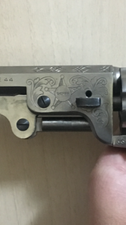 -Revolver en acabado acero pulido en buen estado.
 Le falta el tornillo de doble seguridad que va encima 02