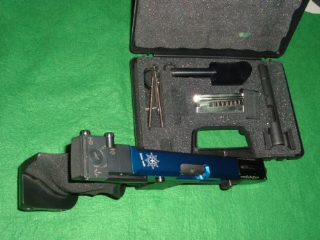 Se vende PISTOLA HAMMERLI guiada con F Calibre 22 con maletín original + kit conversor del 32 SW. Maletin 00