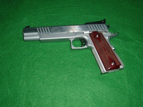 Se vende pistola S. T. I. TARGET MASTER Calibre 9MM guiada como arma de concurso F * * * IMPECABLE* * 02