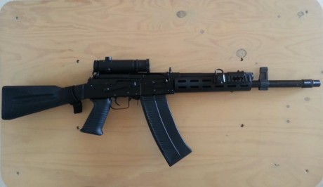 RESERVADA-VENDIDA  :band: 


Vendo SAIGA-12, guiada en "A"
 muy cuidada, piezas con numeracion, 02