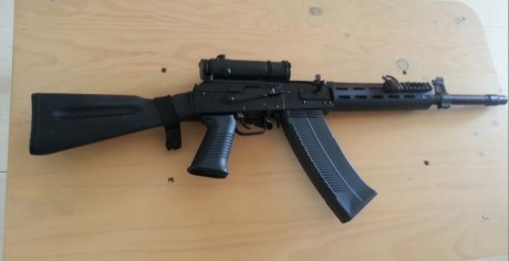 RESERVADA-VENDIDA  :band: 


Vendo SAIGA-12, guiada en "A"
 muy cuidada, piezas con numeracion, 01