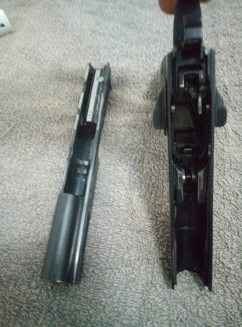 Hola, se vende pistola Tanfoglio Limited del 40 con 4 cargadores y un cañón adicional del 9mm con 2 cargadores,( 02