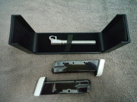 Hola, se vende pistola Tanfoglio Limited del 40 con 4 cargadores y un cañón adicional del 9mm con 2 cargadores,( 42