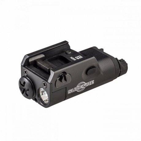 Nueva a estrenar. Linterna por acomple a arma corta o larga por carril pincantilly. Con enganche de extrancción 02