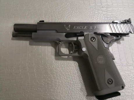 Se vende pistola 9 mm 
5 pulgadas de pura precisión.
900 euros con portes incluidos
2 cargadores
Un saludo 00