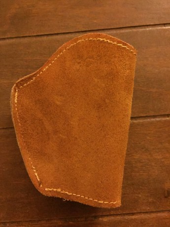 Hola vendo una funda de serrate para zurdos o para portar por diestro en la espalda para una s&W Bodyguard 00