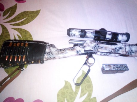 Hola vendo Brorwing BLR calibre 3006 con dos cargadores y maderas con vinilo camuflaje carril weaver y 01