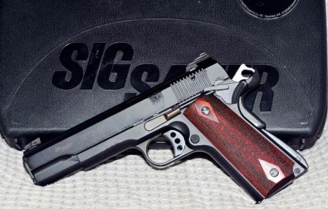 Por dejar el tiro, un amigo me encarga la venta de una Sig Sauer 1911del 22Lr.
El arma funciona perfectamnete, 02